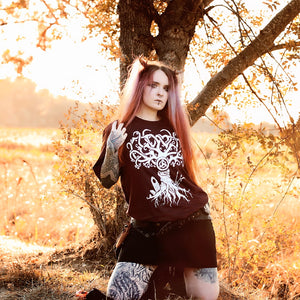 Alienor Fates wearing an Avalon apple tree t-shirt